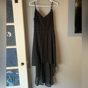 Black, spaghetti strap dress, with black polka dots.